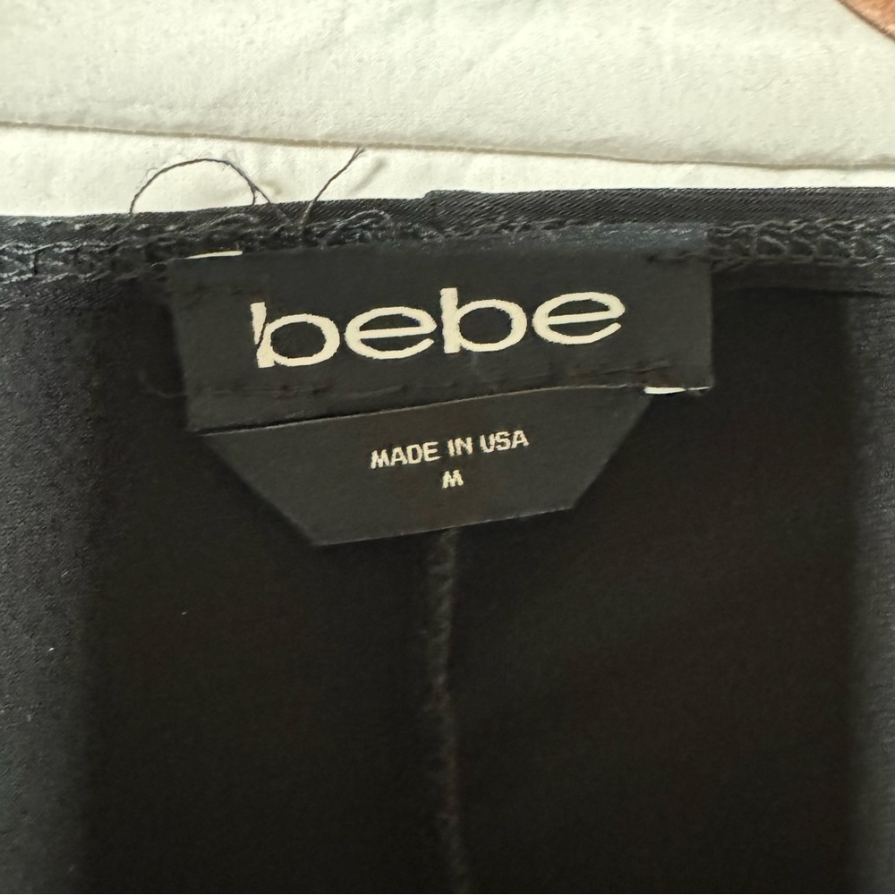 Black long sleeve BeBe dress